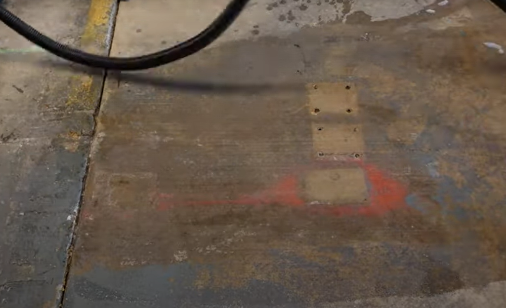 How can you get paint off of concrete without using chemicals?